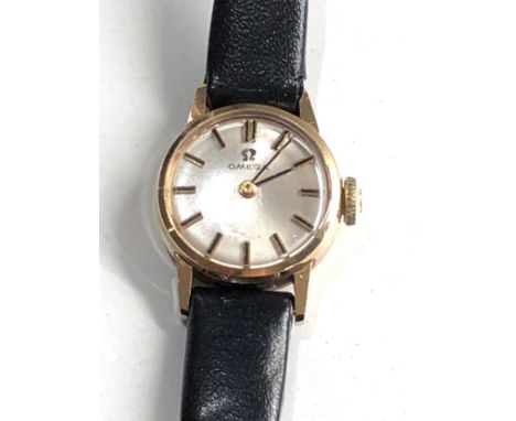 Ladies vintage 9ct gold omega wristwatch the watch is ticking but no warranty given 