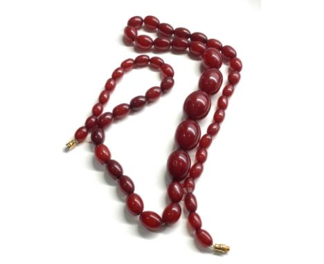 Vintage cherry amber bakelite bead necklace with no internal streaking, 61.3g 