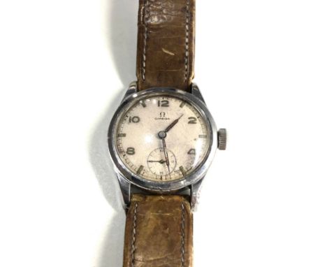 Vintage Gents military style Omega wristwatch omega strap and buckle watch is ticking but no warranty given 