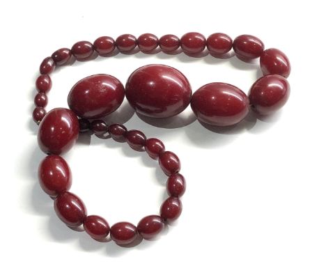 Vintage cherry amber bakelite necklace good  internal streaking, 52.3g 