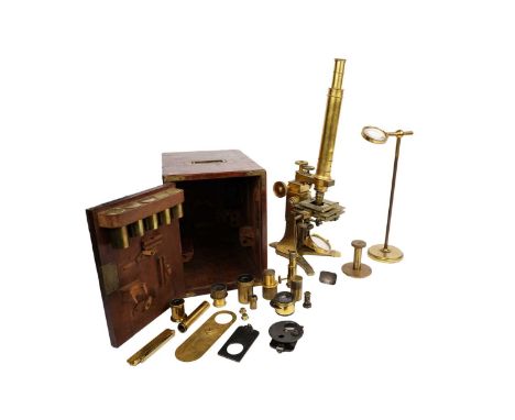 A Victorian lacquered brass compound monocular microscope, by Andrew Ross, London, the main viewing tube with ratchet mechani
