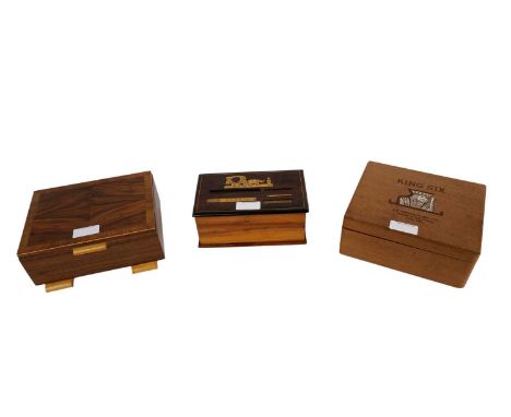 A 20th Century walnut cigarette dispenser, with inlaid marquetry depicting carriage drawn by bulls and a cigarette engraved '