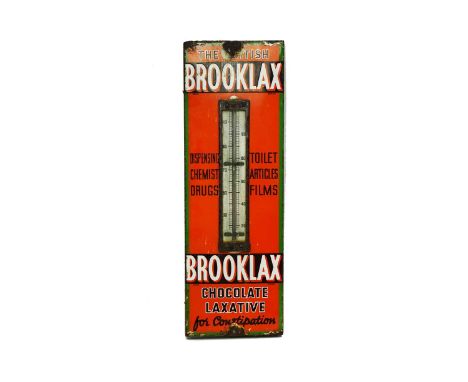 A vintage Brooklax 'Chocolate Laxative' enamel sign, with white and brown font on an orange ground, fitted with a thermometer