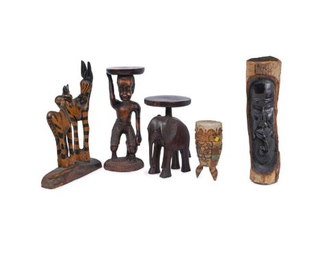 A selection of 20th Century African carved wooden sculptures, comprising: a zebra and foal figure group, with stylised curved