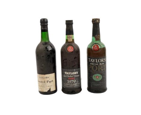Three bottles of port, comprising: Taylor’s Crusted Port, bottled in 1973, approximately 70cl, unknown proof; a bottle of Tay