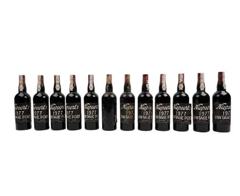 Twelve bottles of Niepoort 1977 Vintage Port, bottled in 1979, 75cl, (one with mostly missing label).