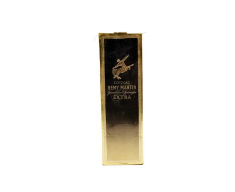 A bottle of Remy Martin Grande Fine Champagne Cognac, with swing tag and bottle sleeve, 70cl, unknown proof, boxed.