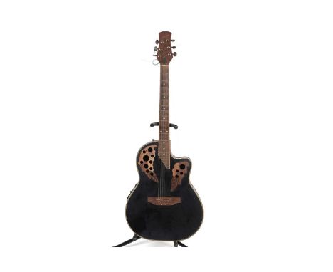A Stagg bowl back electro-acoustic guitar, with shallow moulded back, fitted with EQ-505 system.Note: The Neil Ford Collectio