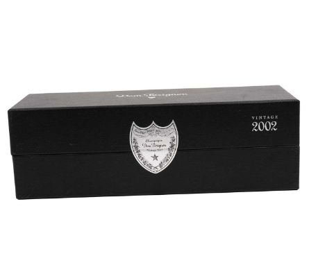 A bottle of Dom Pérignon Vintage 2002, sealed in presentation box.