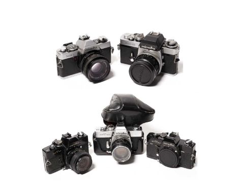 A selection od Minolta SLR cameras, comprising: a Minolta SR T303 camera, fitted an Auto-Rokkor 55mm f1.8 lens and case; a Mi