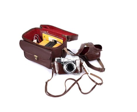 A Kodak Retina Reflex camera, fitted with a Retina-Xenon 50mm f2 lens, in fitted brown leather case; together with a selectio