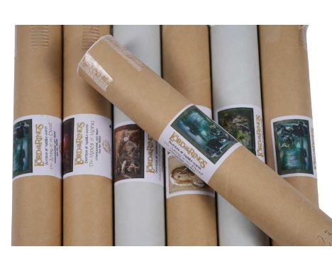 A collection of Lord of the Rings collectibles, including: sets 2 and 3 of the Limited Edition Collectors Plates, by Cards In