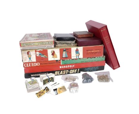A collection of vintage games and collectibles, including: a Chad Valley 'Give A Show' projector; Waddington's 'Blast-Off' bo