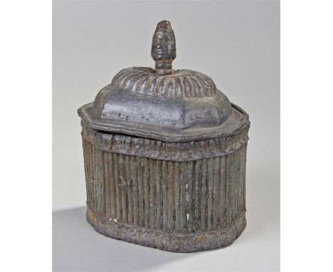 18th Century lead tobacco box, with figural finial top above a gadrooned led and conforming body, 13cm wide, 17cm high, 10cm 