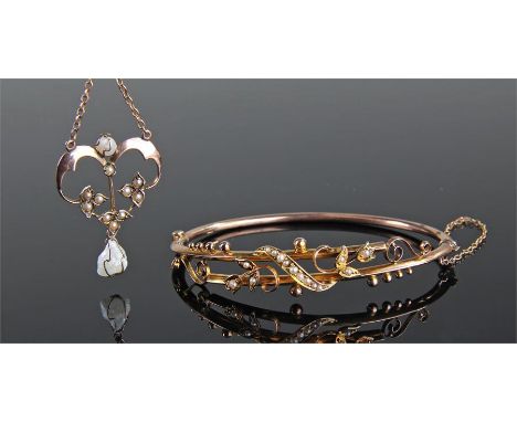 9 carat gold pearl set bracelet, with flower head and scroll design, together with a 9 carat gold pearl set pendant, total we