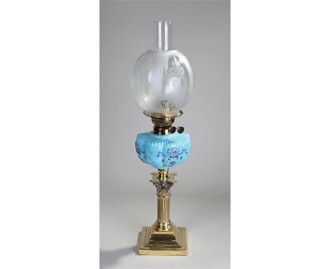 Victorian oil lamp, the etched shade above a blue milk glass font with ribbon swags, raised on a Corinthian column, platform 