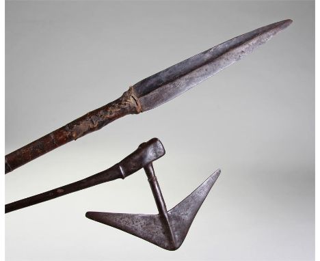 19th Century Zulu steel throwing axe, with pommel end and long shaft terminating with an arrow head shape axe head, 61cm long