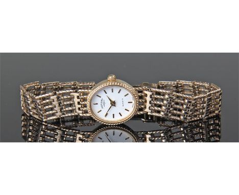 Rotary 9 carat gold wristwatch, the white signed enamel dial with baton hours, 9 carat gold case and strap, gross weight 14.7