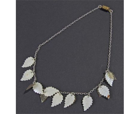Early 20th Century leaf design bracelet, with two coloured leaf design on a chain