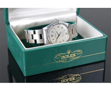 Rolex Oyster perpetual stainless steel gentleman's wristwatch, the silvered dial with arrow hour makers and the numerals 3,6 
