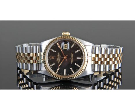 Rolex bi-metal oyster perpetual datejust, steel and 18 carat gold, the black dial with gilt hour batons, magnified date apert
