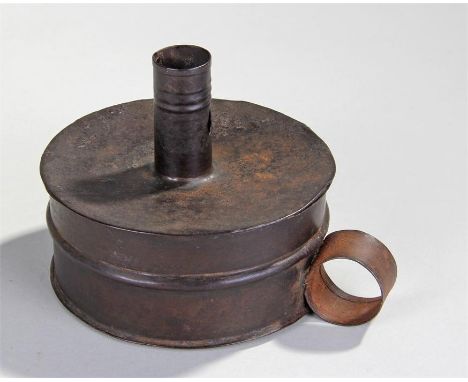 Rare tin tinderbox with damper, the drum box with looped handle and candle stick, the interior housing the damper, and match 