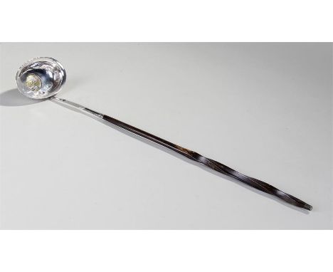 18th Century silver and whale baleen toddy ladle, with a long twisted baleen handle, with a silver bowl inset with a Queen An