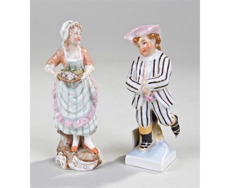 Two Meissen porcelain figures, the first with a lady holding a basket of grapes, cross sword marks and impressed number 32, 1