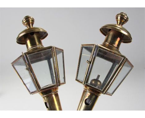 19th Century pair of brass lamps, the turned finial top above a six glass lamp and tapering body, 30cm high, (2)
