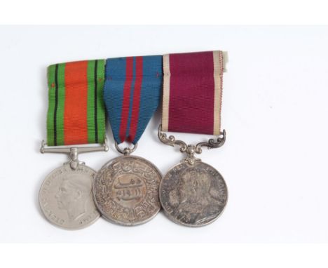 Interesting Edwardian and later medal trio - comprising Army Long Service and Good Conduct medal, named to 8766 DMR: RA. Ashm