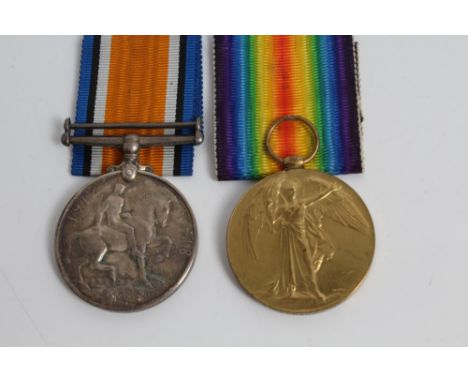 First World War pair medals - comprising War and Victory, named to 243048 PTE. S. J. Manning. The Queen's R