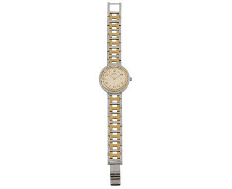 HERMÈS Armbanduhr "CLIPPER". Klassisches Modell in Bicolor (Gold- &amp; Silberfarben). Glieder in H-Form. Etui anbei. Guter E