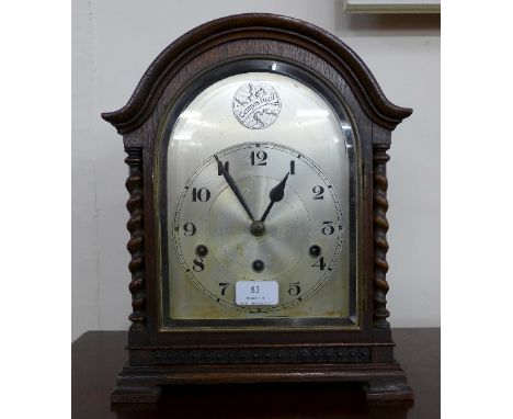 An early 20th Century oak Westminster chime bracket clock