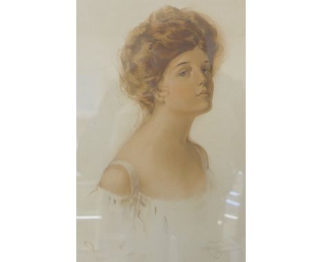 A Bessie Pease Gutmann oval half portrait print of a lady, framed