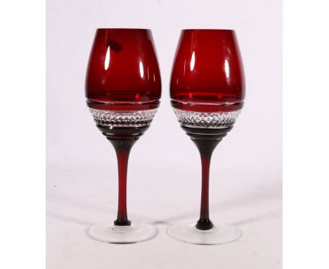 A pair of John Rocha Waterford ruby glass wine glasses.&nbsp; 