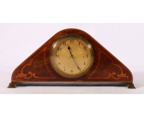 Art Nouveau mahogany and inlaid mantle clock of triangular form raise on bracket feet with French movement, 28cm wide 