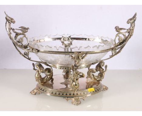 Silver plated centre piece fruit bowl having etched glass bowl raided on silver plated base with mermaid supports by H W & Co