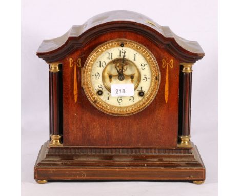 Mahogany and inlaid art nouveau mantel clock with visible escapement, 29cm wide. 