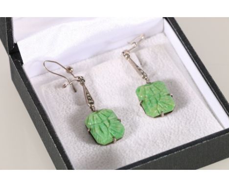 Pair of Art Deco style carved jade type hardstone pendant earrings set with marcasite stones 