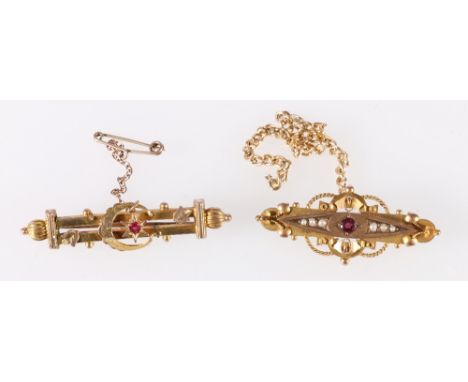 Victorian 9ct gold ruby and seed pearl set brooch and another 9ct gold ruby set brooch, gross 7.7g. (2)One brooch safety chai