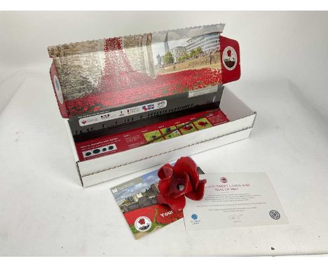 Paul Cummins Tower of London ceramic poppy, one of 888,246 placed outside the Tower of London in 2014 to marks the centenary 