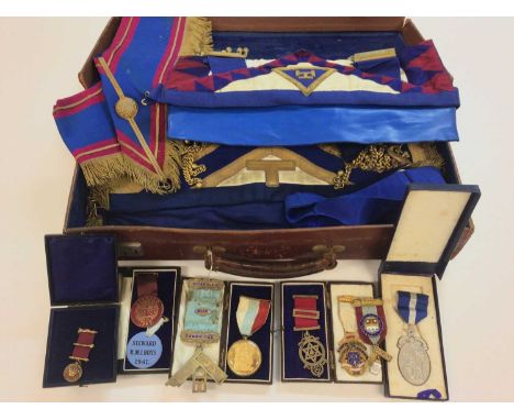 Group of mainly 1930s - 50s Masonic Regalia to include silver, silver gilt and gilt metal jewels and sash and apron, all cont