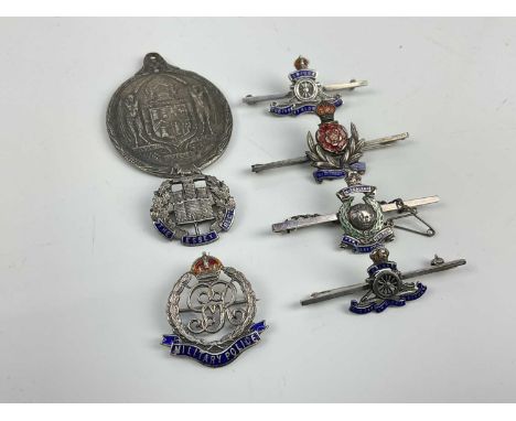 Six silver and enamel military sweetheart brooches to include Royal Marines, Royal Artillery and Essex Regiment, together wit