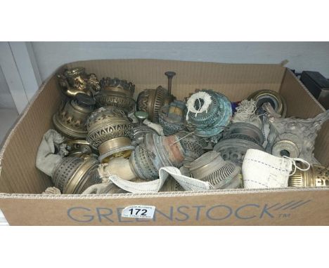 A large quantity of oil lamp burners