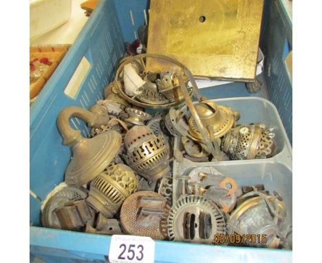 A quantity of oil lamp spares including burners