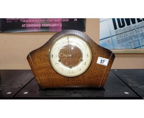 A mantle clock with keys & pendulum (in working order)