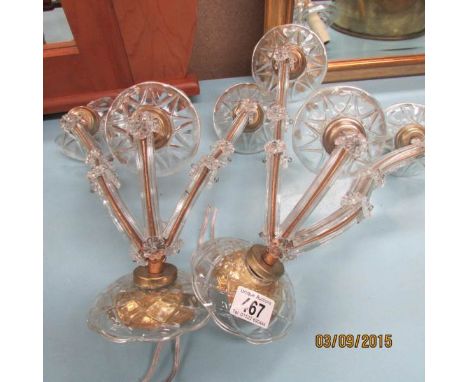 A pair of 3 lamp wall lights