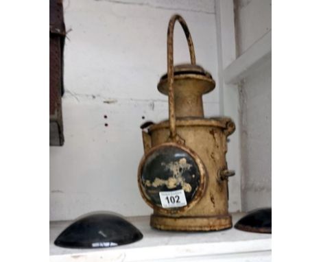 A railway lamp & 2 lenses