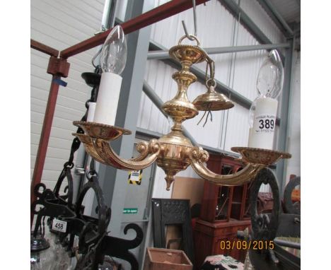 A 5 lamp brass ceiling light