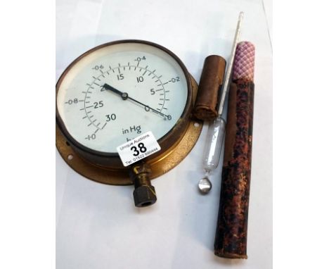 A pressure gauge & thermometer with original case